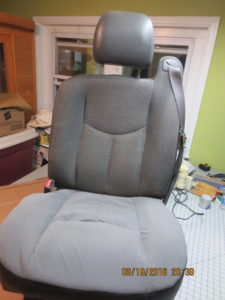 Reupholster bucket truck seat out of a 2006 Chevrolet 