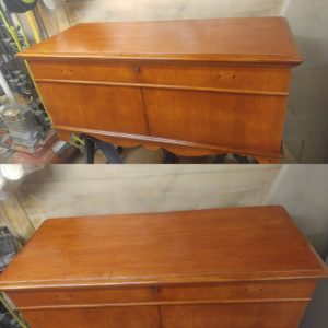 1960's Maple cedar chest. The chest had a water ring that was very deep, because if that we reveneered the top. Then applied a gunstock stain and finished it out with a low gloss hand rubbed Tung Oil finish.